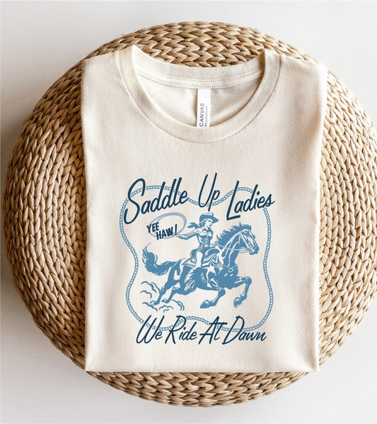 Saddle Up Ladies We Ride At Dawn Graphic Tee